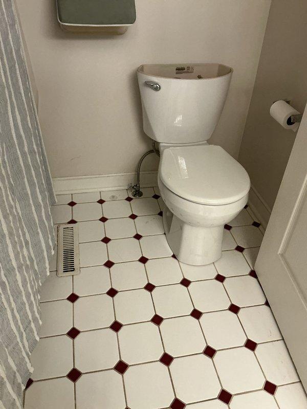 Responded to callback following recent toilet installation where bathroom door clearance was compromised. Upon arrival, assessed the toilet positioning in relation to door swing path and identified interference issue. Adjusted toilet placement to ensure proper clearance for full door operation while maintaining correct flange alignment and seal integrity. Verified door now closes completely without obstruction and confirmed toilet remains securely mounted with no leaks at base or supply connection.