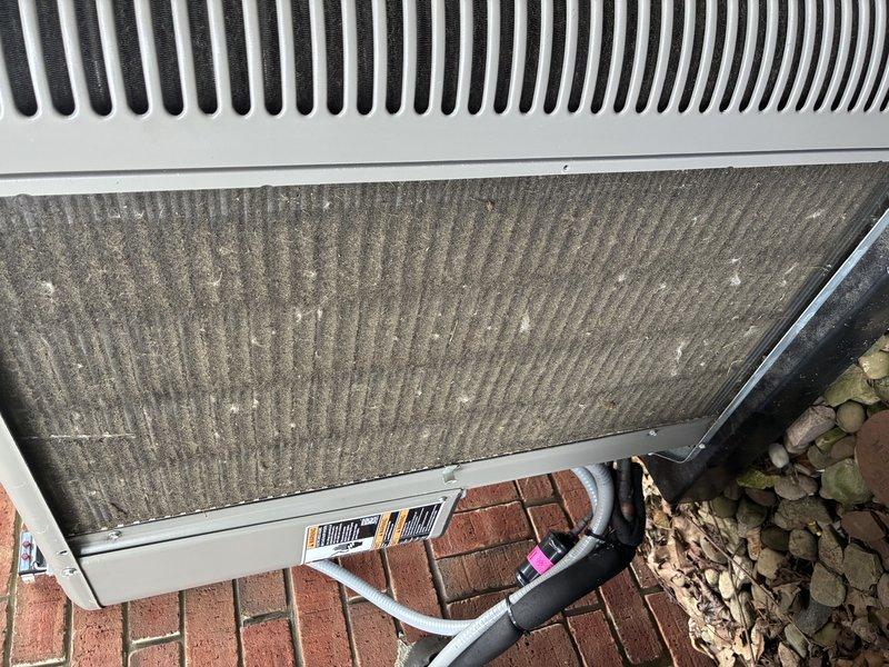 Completed MVP cooling maintenance visit on 2-year-old system. Performed inspection of outdoor condensing unit, noting significant dirt and debris accumulation on condenser coil requiring cleaning. Inspected indoor mechanical room equipment including air handler, electrical disconnects, and associated plumbing connections. All components operational and system running within normal parameters upon completion of preventive maintenance procedures.
