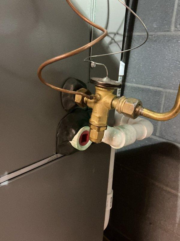 Completed routine maintenance and performance evaluation on 5-year-old air conditioning system. Performed comprehensive system inspection including refrigerant line temperature diagnostics, verified proper operation of all components, and confirmed system operating within manufacturer specifications with no deficiencies noted.