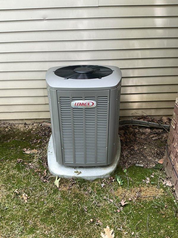 Completed comprehensive AC tune-up on 6-year-old Lennox condensing unit. Performed standard maintenance including inspection of electrical connections, cleaning of condenser coil, verification of proper operation, and system documentation through photos of outdoor unit and electrical panel.