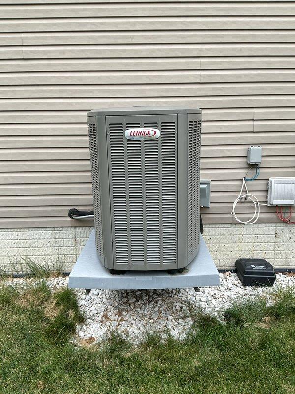 Completed comprehensive AC tune-up on Lennox condensing unit. Performed standard maintenance inspection of outdoor condenser, electrical disconnect box, and associated components. All systems found operating within normal parameters with no immediate service needs identified.
