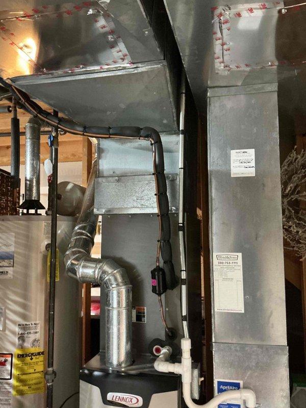 Completed MVP AC maintenance on residential cooling system. Performed comprehensive inspection of Lennox air handler unit, ductwork connections, and refrigerant lines in basement mechanical room. Verified proper operation of all system components, checked electrical connections, and confirmed adequate airflow through supply and return ducts.