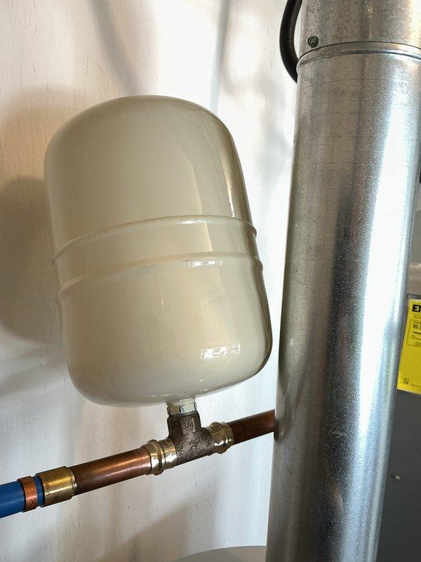 Replaced an 8-year-old Bradford White water heater that was no longer staying lit with a new Bradford White 40-gallon short water heater featuring an 8-year manufacturer warranty. Installed a thermal expansion tank on the horizontal copper water line to protect the system from excessive pressure buildup. All connections were secured, system was tested for proper operation, and the installation was completed in the utility closet alongside existing HVAC equipment.