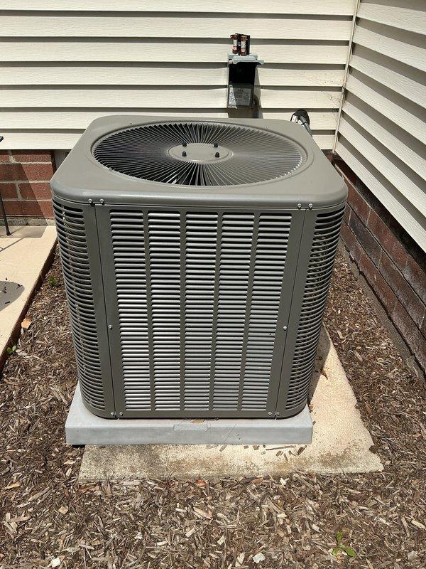 Completed MVP cooling maintenance visit on residential air conditioning system. Performed comprehensive inspection of outdoor condenser unit, verified proper operation of fan assembly, and documented equipment condition with photos showing unit in good operational status with intact housing and components.