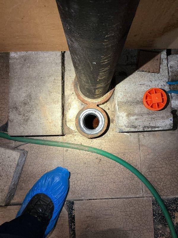 Responded to laundry area drain backup and slow drainage issue in 1969-built home. Located main drain cleanout access point in utility area and deployed mechanical cable auger to clear blockage in main drain line. Successfully removed obstruction and restored proper drainage flow to laundry area drain system. Tested drainage performance and confirmed full functionality upon completion.