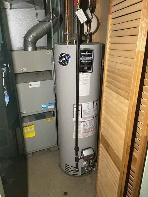 Responded to service call for 30-year-old tanked water heater with pilot light failure. Upon arrival, inspected Bradford White unit and determined thermocouple malfunction preventing pilot from remaining lit. Replaced faulty thermocouple, tested pilot ignition system, and verified proper flame retention. Confirmed water heater restored to full operational status with stable pilot light and burner function.