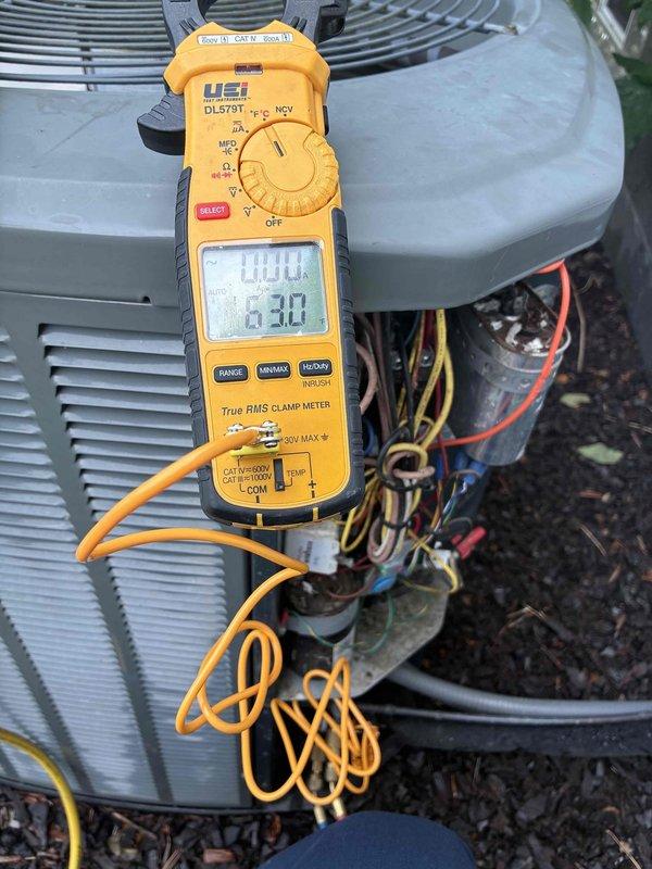 Completed annual air conditioning maintenance on outdoor condensing unit. Performed comprehensive system inspection including electrical connections, capacitor condition, and compressor operation. Measured and verified electrical current draw using clamp meter, confirming proper amperage within manufacturer specifications. Cleaned and inspected contactor, capacitor, and wiring connections in electrical compartment. All components found to be operating normally with no immediate service needs identified. System tested and left in proper working condition.