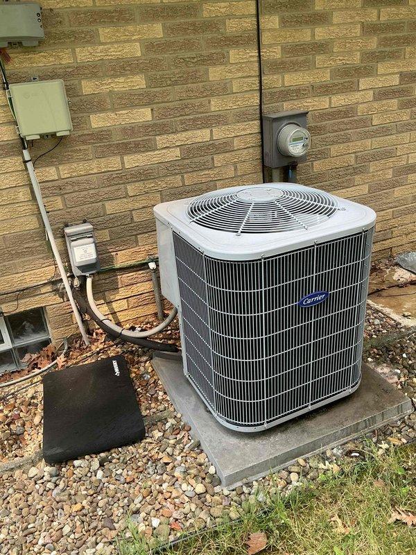 Completed MVP cooling maintenance on 12-year-old Carrier air conditioning system. Performed comprehensive inspection of outdoor condensing unit, verified electrical connections and capacitor operation, and documented equipment condition with unit operating normally. Service appointment was rescheduled from original date to accommodate customer availability.