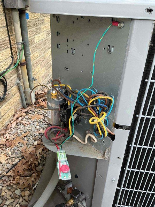 Completed MVP cooling maintenance on 12-year-old Carrier air conditioning system. Performed comprehensive inspection of outdoor condensing unit, verified electrical connections and capacitor operation, and documented equipment condition with unit operating normally. Service appointment was rescheduled from original date to accommodate customer availability.