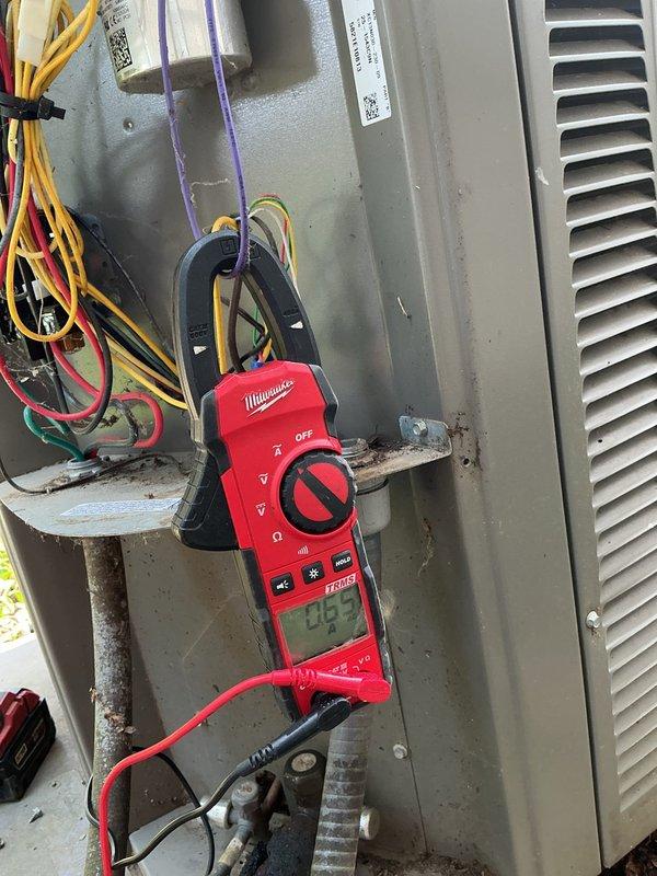 Completed routine maintenance inspection on five-year-old air conditioning system operating without issues. Performed comprehensive diagnostic evaluation including temperature differential measurements using infrared thermometer, electrical current testing with clamp meter showing 4.5 amp draw, and capacitor voltage verification. Inspected all electrical connections, wire terminals, and control components for proper operation. Verified Aprilaire humidifier settings and functionality. System tested and confirmed operating within normal parameters with no deficiencies noted.