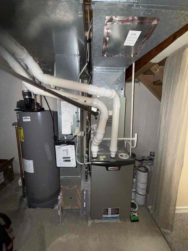 Completed MVP cooling maintenance visit on 14-year-old residential HVAC system. Performed comprehensive inspection of blower assembly, verifying proper operation of fan wheel and motor components. Documented equipment condition including furnace, ductwork, and associated mechanical systems through photographic records showing normal operational wear with minor dust accumulation but no significant deterioration requiring immediate attention.