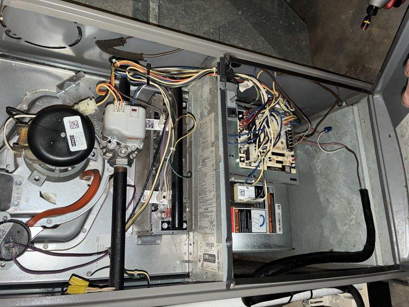 Completed routine MVP cooling maintenance visit on 4-year-old HVAC system. Accessed interior components through main service panel and inspected all electrical connections, control boards, motor assembly, and wiring harnesses. All components found to be functioning properly with connections secure and wiring professionally organized. Noted normal age-related surface dust accumulation and minor debris in outdoor housing. Verified capacitor, relay modules, and control boards operational with no signs of electrical failure or component degradation. System operating within normal parameters with all safety controls functioning as designed.