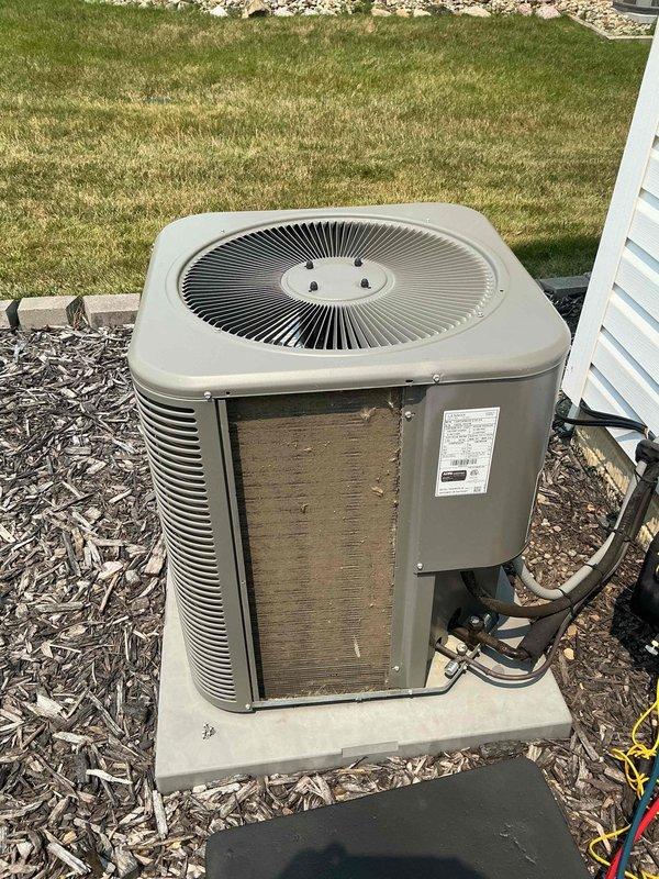 Completed MVP cooling maintenance visit on 5-year-old residential air conditioning system. Performed comprehensive inspection of outdoor condenser unit, accessed electrical compartment to verify all connections and components, checked capacitor operation, and documented equipment condition through photography. Unit operating within normal parameters with no deficiencies noted.