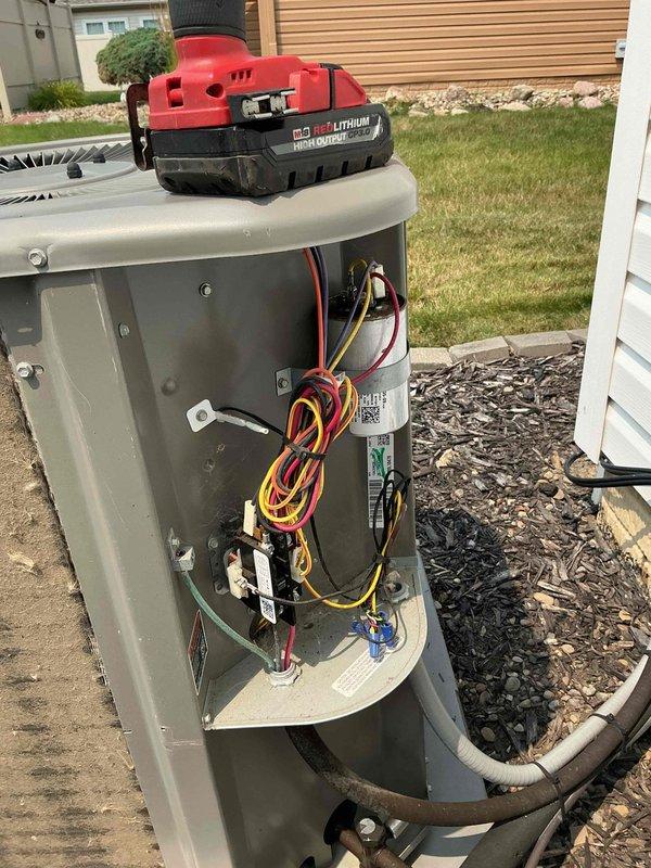Completed MVP cooling maintenance visit on 5-year-old residential air conditioning system. Performed comprehensive inspection of outdoor condenser unit, accessed electrical compartment to verify all connections and components, checked capacitor operation, and documented equipment condition through photography. Unit operating within normal parameters with no deficiencies noted.