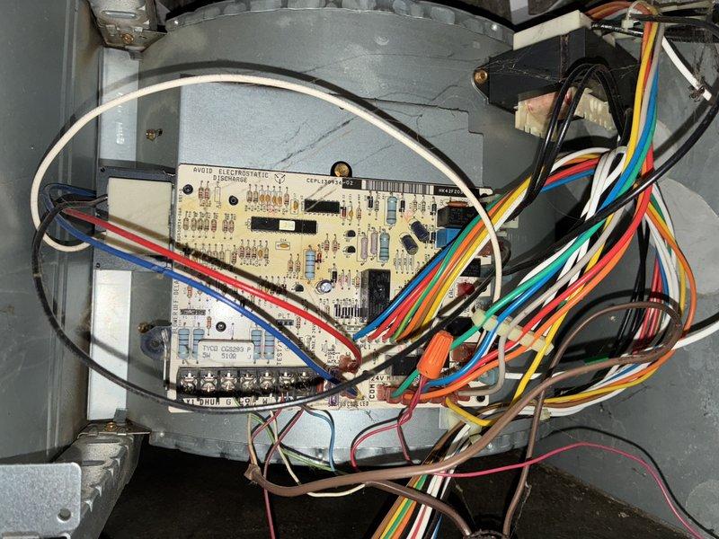 Responded to service call for air conditioning system not cooling adequately and outdoor unit producing loud buzzing noise. Upon arrival, performed diagnostic inspection of both indoor and outdoor components. Inspected control board and electrical connections at air handler, verifying all wiring terminations and control circuits. Noted heavily soiled air filter restricting airflow through system. Due to advanced age of equipment and operational issues present, advised customer that unit has reached end of service life and replacement would be most cost-effective solution rather than repair.