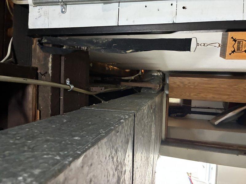 Assessed existing electrical wiring for a built-in countertop electric range in a 1901 home with 1990s electrical updates. Inspected circuit capacity, wire gauge, and junction box configuration to determine compatibility with new range installation. Documented current wiring conditions and provided quote for future installation work to be completed after countertop replacement.