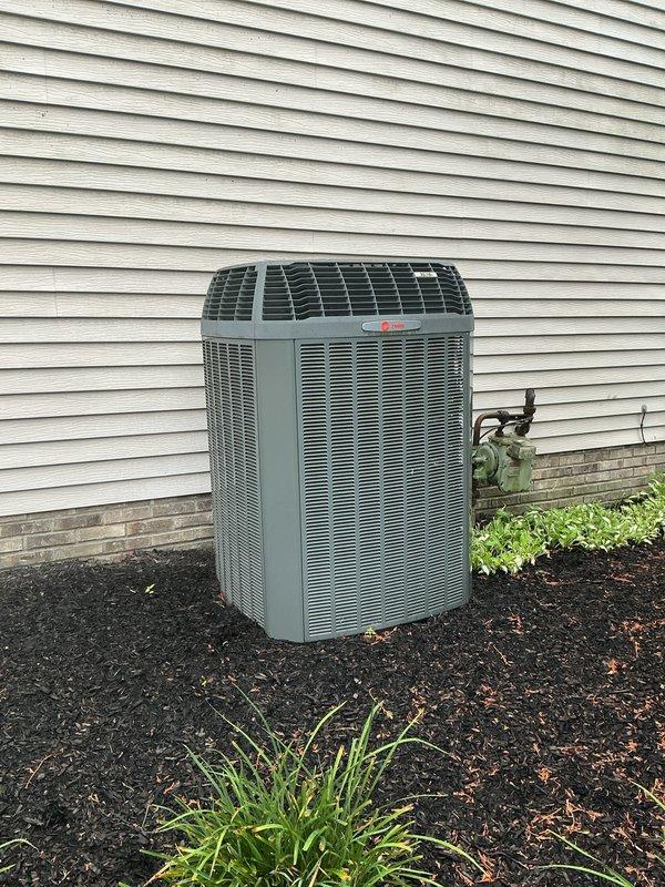 Completed MVP cooling maintenance visit on 13-year-old Trane HVAC system. Performed comprehensive inspection of outdoor condenser unit and indoor furnace components, verified proper operation of all system components, checked refrigerant lines and electrical connections, and documented equipment condition through photographic records. All components found operating within normal parameters with no immediate service needs identified.