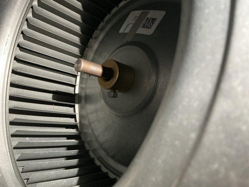 Completed preventive maintenance service on a one-year-old window-mounted air conditioning unit. Performed comprehensive AC tune-up including inspection of blower wheel assembly, motor components, and all accessible mechanical systems. All components found to be in good operating condition with minimal dust accumulation, unit operating within normal parameters.