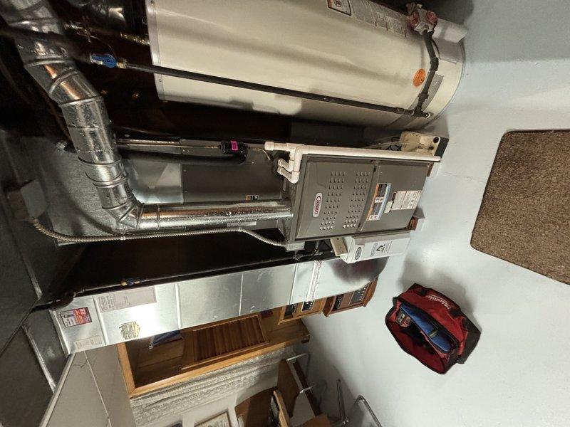 Completed scheduled MVP cooling maintenance visit on 3-year-old HVAC system. Performed comprehensive inspection of indoor air handler unit and outdoor condensing unit, checked all electrical connections at disconnect box, verified proper refrigerant levels and system operation, and documented equipment condition with photographs for service records.