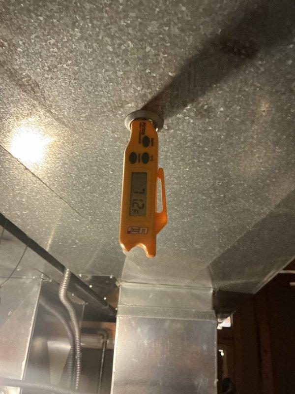 Performed preventative maintenance on a twenty-year-old central air conditioning system. Accessed the air handler unit, inspected the evaporator coil and internal components for proper operation, and verified temperature differential at supply registers using calibrated digital thermometer. System operational upon completion of service.