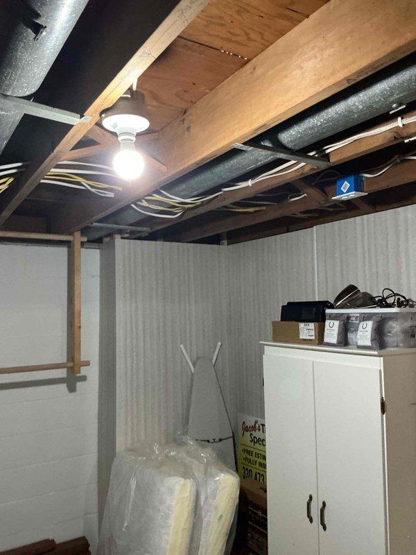 Conducted comprehensive site assessment for Generac generator installation at residential property. Evaluated exterior utility meter location and electrical service entry point on building exterior, documented existing gas line infrastructure and clearance requirements from building openings and landscaping features. Inspected basement electrical panel location and available routing paths through unfinished basement space, assessed ceiling joist configuration and existing conduit pathways for transfer switch installation and generator circuit integration. Documented suitable mounting locations considering foundation vents, utility connections, and setback requirements for code compliance. Provided detailed photographic documentation of service entrance equipment, basement infrastructure, and proposed installation area to support accurate material takeoff and labor estimation for automatic standby generator system.