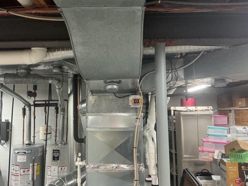 Completed scheduled MVP cooling maintenance visit on 5-year-old HVAC system. Performed comprehensive inspection of indoor air handler unit located in basement utility area and outdoor condensing unit. Checked refrigerant lines, electrical connections, drainage system components including PVC condensate lines, and verified proper operation of all system controls. Equipment operating within normal parameters with no immediate service needs identified.