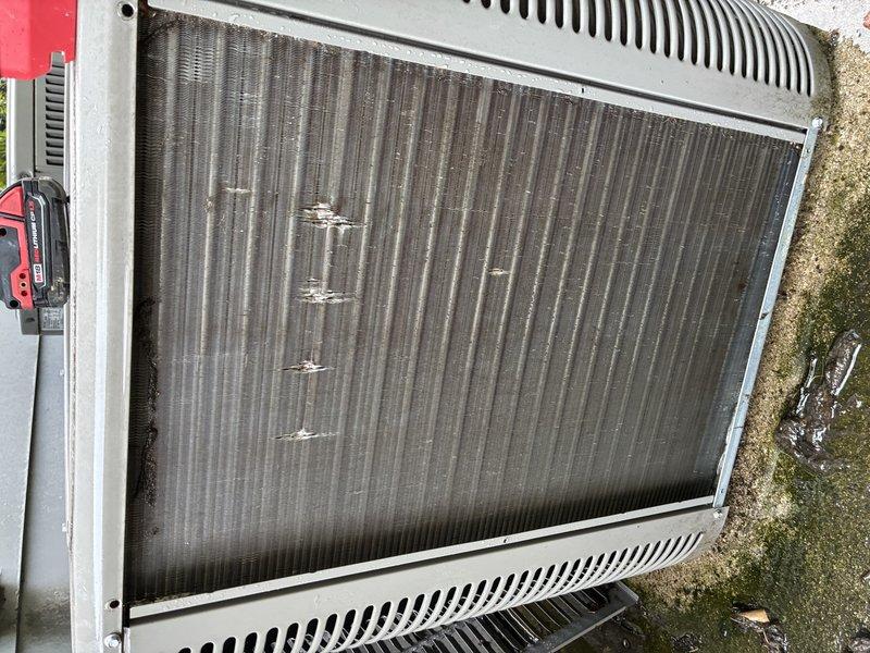 Performed comprehensive maintenance tune-up on three residential air conditioning units. Conducted standard preventive maintenance procedures including inspection of all major components, refrigerant level verification, electrical connection testing, and condenser coil cleaning. Replaced dirty pleated air filter on one unit showing significant dust and debris accumulation. Inspected outdoor condenser unit with visible fin damage from physical impact; documented bent and crushed fin sections that may affect airflow efficiency. All three systems operational upon completion with recommendations provided for future service considerations on the unit with damaged condenser fins.