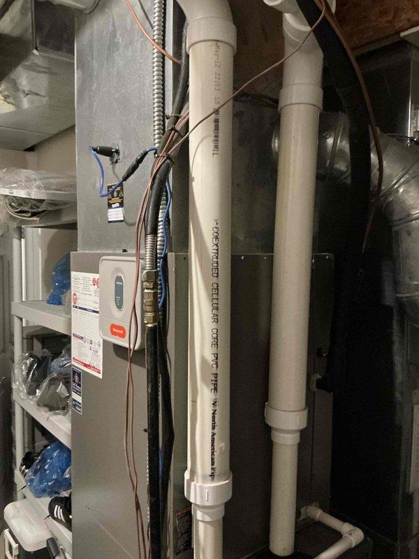 Conducted comprehensive estimate for furnace and air conditioning system replacement at residential property. Customer reported unusually high utility bills and history of multiple refrigerant recharges by previous service provider. Evaluated existing Carrier furnace installation and associated air conditioning system, documenting current equipment configuration including PVC venting, electrical connections, and ductwork integration. Assessed system performance concerns and provided replacement options to address ongoing efficiency issues and repeated refrigerant loss indicating potential system failure.