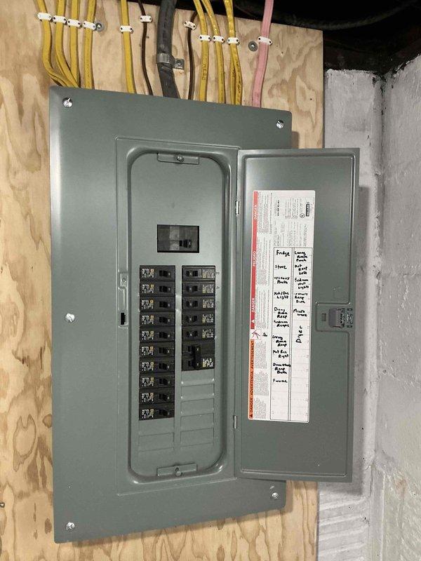 Conducted on-site evaluation for air conditioning system addition to existing forced-air heating system in residential basement mechanical room. Assessed current HVAC infrastructure including gray metal furnace unit with metallic ductwork, electrical panel capacity with available circuit breaker positions, and utility space configuration. Documented equipment layout, existing duct system routing, and electrical service capabilities to prepare comprehensive estimate for AC installation. Provided homeowner with detailed proposal for integrating cooling system with current heating equipment.