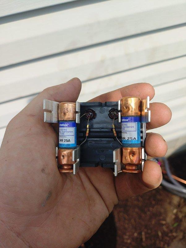 Completed first-time air conditioning and evaporator coil installation. Installed new outdoor condensing unit on concrete pad with proper refrigerant line connections, verified 25-amp fuse protection at disconnect, and secured copper refrigerant and insulated suction lines with appropriate mounting hardware and clamps.