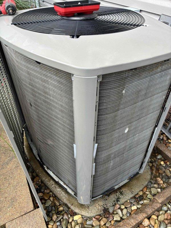 Completed comprehensive air conditioning tune-up on 8-year-old outdoor condenser unit. Renewed maintenance value plan with technician coverage for future service visits. Unit inspected and found to be in good operational condition with normal weathering consistent with age and outdoor installation.