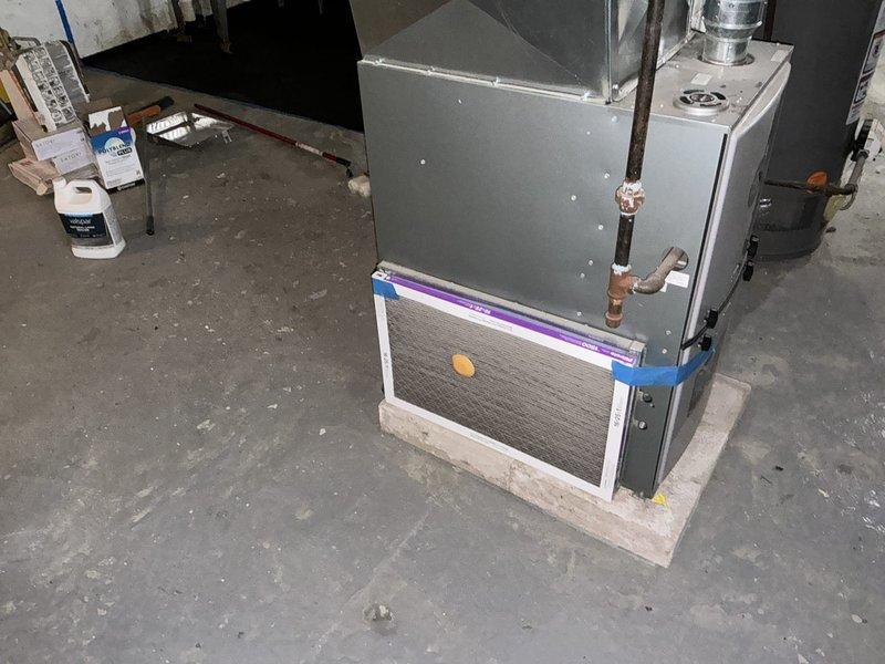 Responded to no cooling complaint on 26-year-old HVAC system and diagnosed failed compressor. Provided comprehensive replacement estimate for aging unit that is beyond economical repair. Documented existing Ruud furnace installation and current system configuration with photos for customer records and replacement planning purposes.