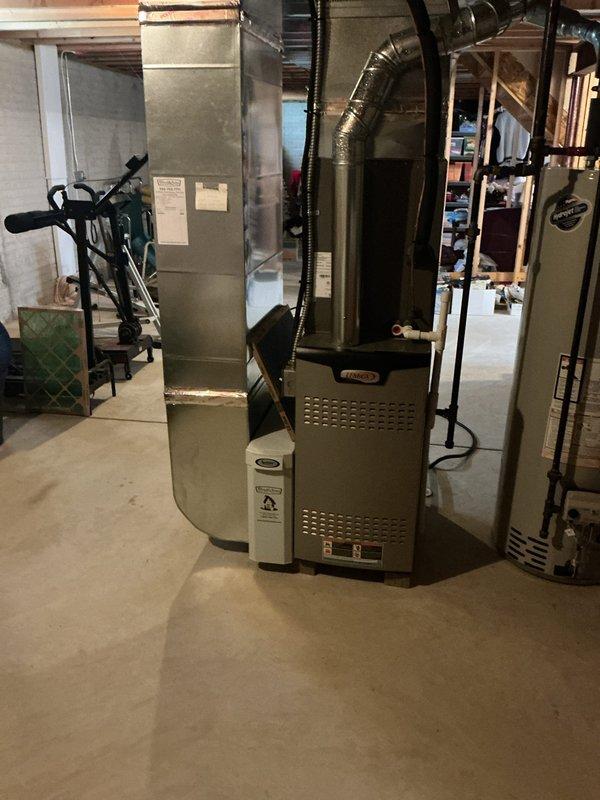 Completed comprehensive preventive maintenance on a two-year-old Lennox air conditioning system with no reported operational issues. Performed full system inspection of both indoor furnace/air handler unit and outdoor condensing unit, verified all electrical connections at disconnect box, inspected refrigerant lines and ductwork connections, and confirmed proper system operation. All components found to be functioning within normal parameters with system maintaining coverage under 2025 MVP plan.
