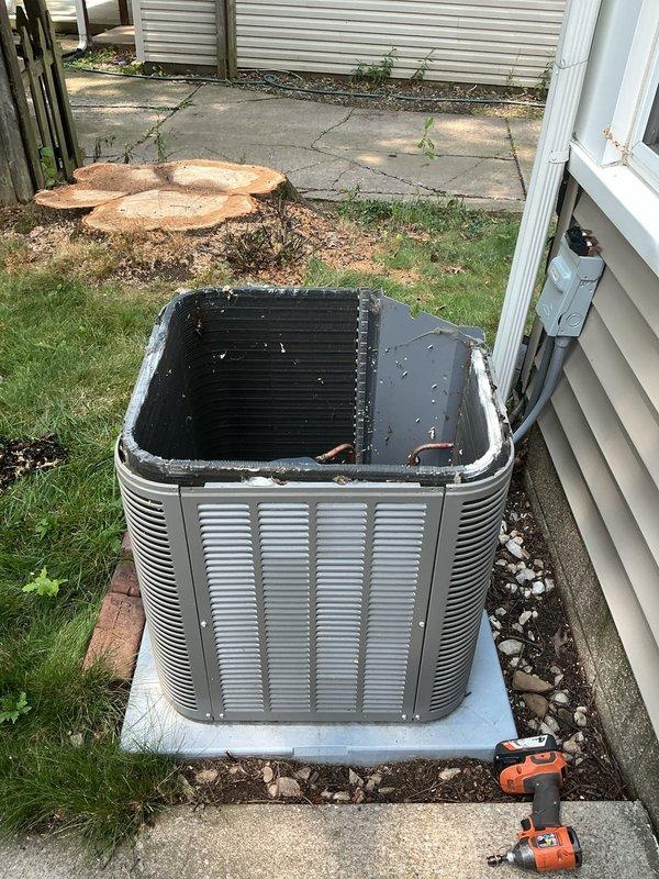 Performed comprehensive air conditioning tune-up on a two-year-old system with no reported issues. Completed full system inspection including removal of top panel to access condenser coils, opened front access panel to inspect electrical components, capacitor, and wiring connections. All components were examined, tested, and verified to be operating within normal parameters to ensure optimal cooling performance for the upcoming season.