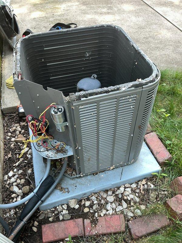 Performed comprehensive air conditioning tune-up on a two-year-old system with no reported issues. Completed full system inspection including removal of top panel to access condenser coils, opened front access panel to inspect electrical components, capacitor, and wiring connections. All components were examined, tested, and verified to be operating within normal parameters to ensure optimal cooling performance for the upcoming season.