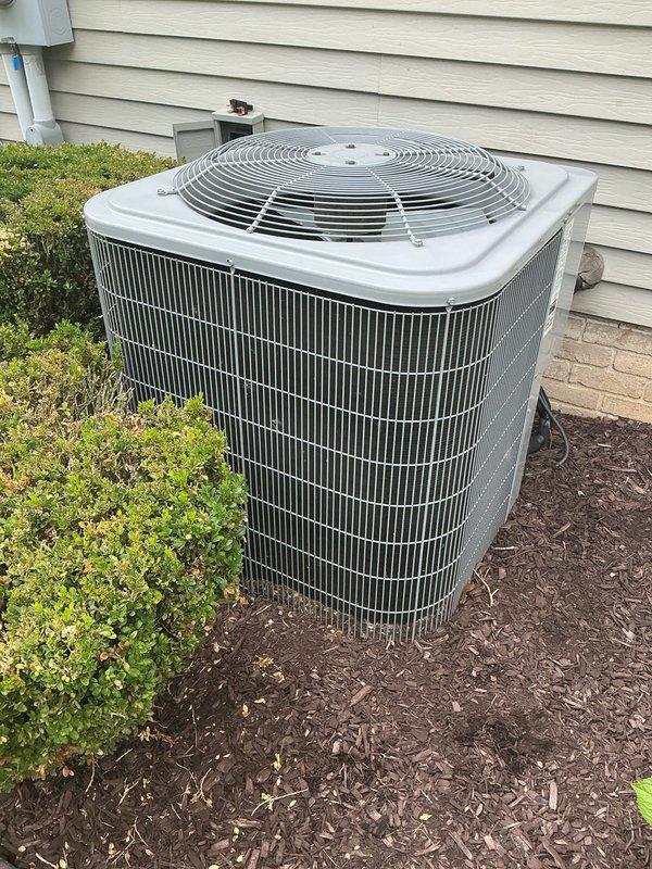 Performed comprehensive tune-up on 2-year-old residential air conditioning system with no reported operational issues. Inspected outdoor condenser unit, verified proper electrical connections at contactor assembly, and documented equipment condition through photographic records. All components found operating within normal parameters; system tested and confirmed functioning properly for continued seasonal use.