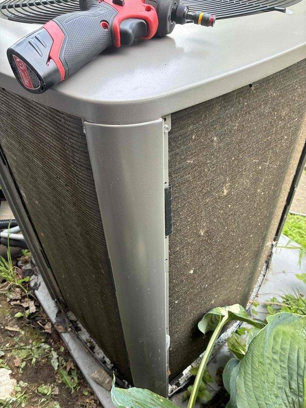 Completed MVP cooling maintenance visit on a 2-year-old system. Accessed outdoor condenser unit, inspected electrical components including capacitor and wiring connections, and documented equipment condition with photos showing unit exterior with visible dirt accumulation and interior electrical compartment with all connections intact.