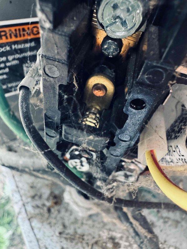 # HVAC Service Report

## Summary
Responded to no-cool complaint on 3-year-old AC system. Diagnosed failed contactor with severe contamination and burn damage, replaced contactor and damaged line set section, restored system to normal cooling operation.

## Work Performed

Upon arrival, found AC system completely non-operational with no power to outdoor condensing unit. Visual inspection revealed contactor assembly heavily contaminated with dust, dirt, and carbon deposits indicating electrical arcing and overheating. Terminal connections showed significant discoloration and tarnishing, with evidence of sustained arcing damage to contact surfaces.

Performed electrical testing and confirmed contactor failure as primary cause of system shutdown. Contacts were welded together from excessive current draw, preventing proper cycling. Brass terminal screws exhibited heat damage and oxidation consistent with poor electrical connection over time.

During outdoor unit inspection, discovered refr