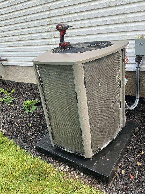 Completed MVP preventive maintenance cooling visit on residential air conditioning system. Inspected outdoor condenser unit, which showed normal operational wear with intact protective grilles and cabinet. The evaporator coil filter was found heavily clogged with dust and debris accumulation, restricting airflow to the system. Cleaned filter thoroughly to restore proper air circulation and system efficiency. Verified refrigerant lines, electrical connections, and condensate drainage components were functioning correctly. Unit returned to optimal operating condition.