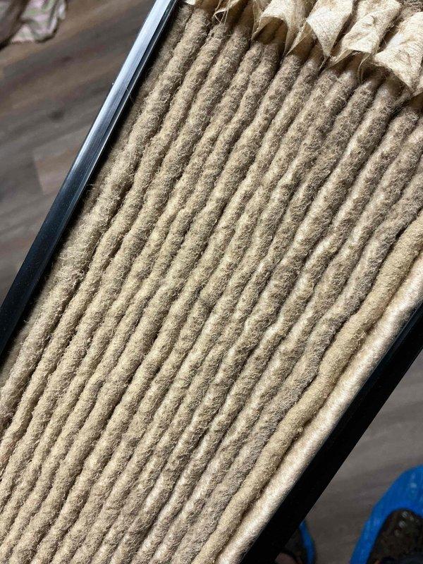 Responded to service call for air purification system displaying error code indicating water panel replacement required. Inspected HVAC system and documented heavily soiled furnace filter showing significant dust and debris accumulation throughout pleated media. Replaced dirty air filter with new unit to restore proper airflow and system efficiency. Addressed water panel maintenance requirement to clear error code and return air purifier to normal operation.