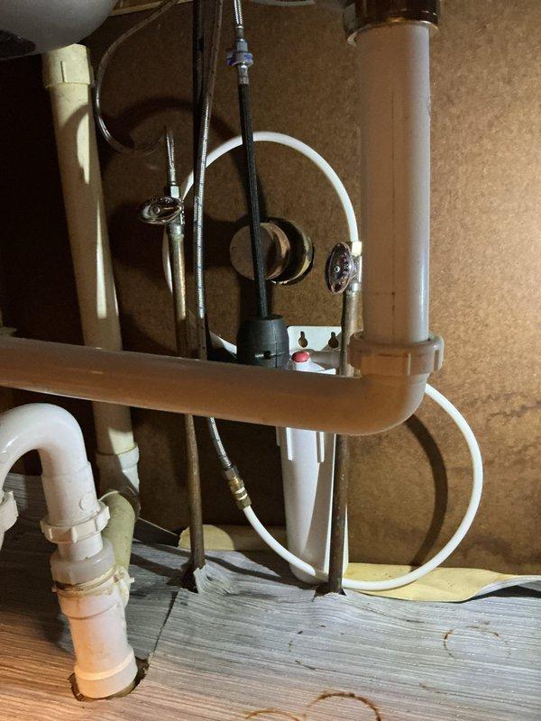 Replaced worn shutoff valves under kitchen sink due to age and deterioration. Removed existing supply line connections and old compression-style valves from hot and cold water supply lines. Installed new quarter-turn ball valves with proper compression fittings to ensure leak-free operation. Reconnected flexible braided supply lines to faucet assembly and tested all connections under full water pressure. Verified proper valve operation and checked for leaks at all connection points. System restored to full functionality with improved shutoff capability for future maintenance access.