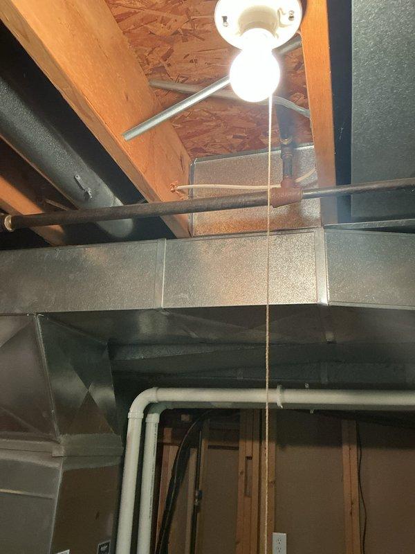 Responded to service call for leaking tanked water heater with leak originating from top of unit. Upon inspection, identified source of leak and assessed condition of water heater and associated plumbing connections. Documented equipment location in basement utility area and exterior plumbing fixtures. Provided estimate for necessary repairs as requested, with follow-up scheduled for completion of work.
