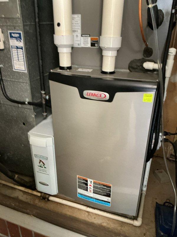 Completed comprehensive spring tune-up and maintenance service on residential Lennox HVAC system. Performed full system inspection including visual assessment of furnace unit, electrical components, PVC venting system, and condensate drainage lines. All equipment found to be in good operational condition with proper installation and no visible signs of wear or deterioration requiring immediate attention.