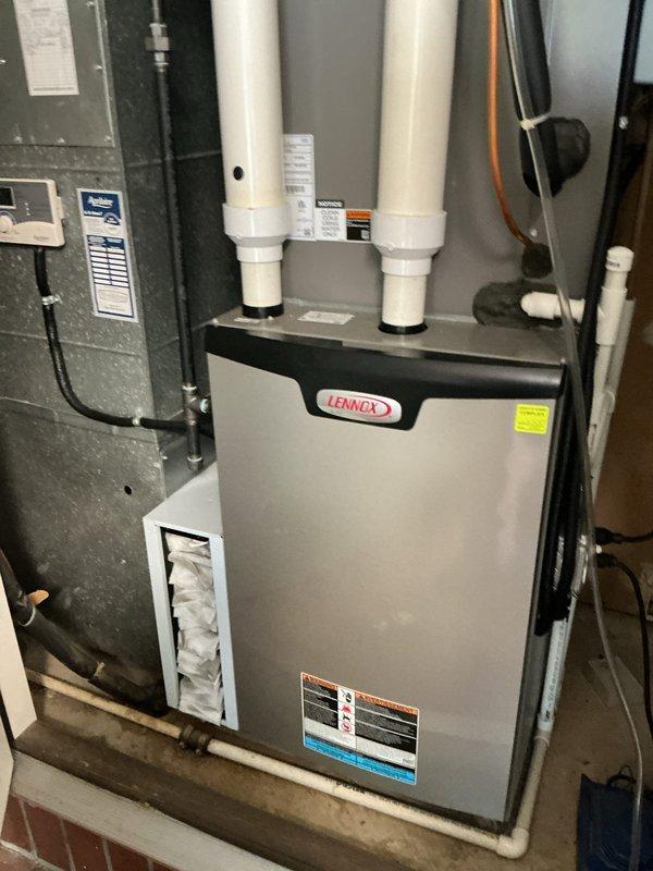 Completed comprehensive spring tune-up and maintenance service on residential Lennox HVAC system. Performed full system inspection including visual assessment of furnace unit, electrical components, PVC venting system, and condensate drainage lines. All equipment found to be in good operational condition with proper installation and no visible signs of wear or deterioration requiring immediate attention.