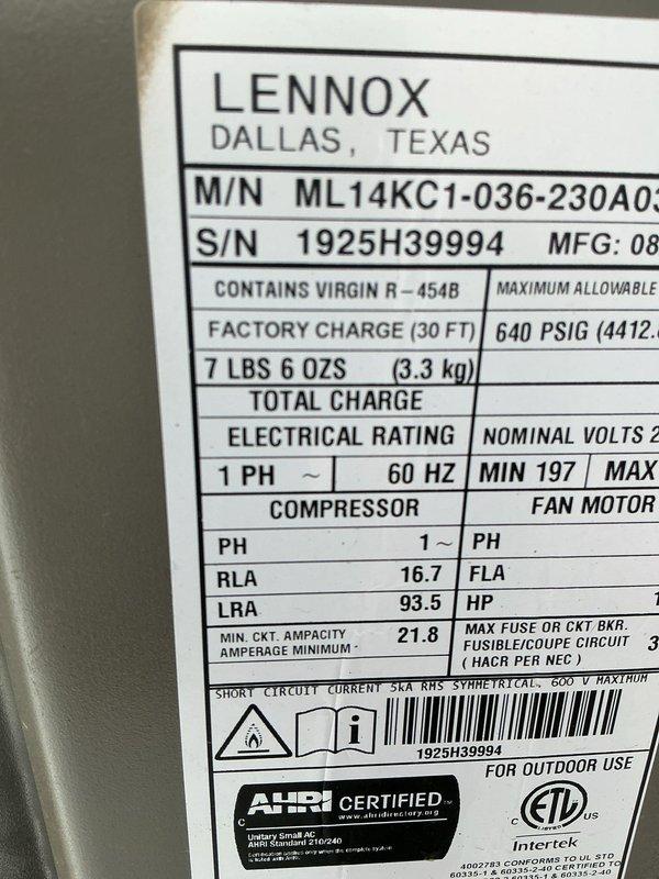 Responded to service call regarding loud boom noise coming from outdoor condenser unit when A/C system starts up, following recent installation. Performed visual inspection of Lennox ML14KC1-036-230A0 condenser unit and electrical connections. Documented unit specifications including R-454B refrigerant charge of 7 lbs 6 oz, electrical ratings, and proper mounting on concrete pad. Verified disconnect box installation and conduit routing from house to unit. Captured photographic documentation of equipment nameplate data and overall installation condition for warranty evaluation purposes.