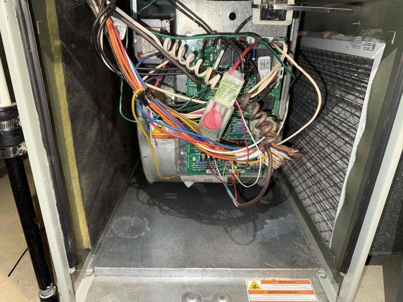 Completed MVP cooling maintenance visit on residential HVAC system. Customer reported concern regarding blower motor requiring cleaning. Accessed furnace cabinet and inspected interior components, including control boards, wiring harnesses, and blower assembly. Verified proper operation of all electronic controls and connections. Inspected ductwork and air handling equipment in mechanical room. System operating within normal parameters upon completion of service visit.