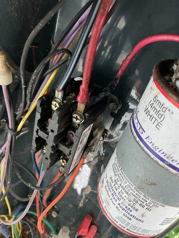 Responded to no cool call on 10+ year old Trane 2-zone central air system with compressor previously replaced in 2008. Upon inspection of outdoor condensing unit, found failed dual run capacitor preventing compressor and condenser fan operation. Replaced defective capacitor with new Emerson unit rated to manufacturer specifications, verified all electrical connections at terminal block, and tested system operation. Unit now cooling properly with compressor running and proper amp draw on both zones.