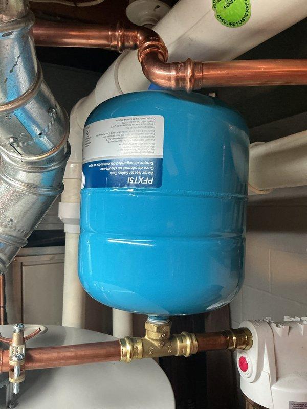 Replaced leaking 50-gallon Bradford White water heater with new 50-gallon unit featuring 6-year manufacturer warranty. Installed new expansion tank and completed all necessary plumbing connections using copper pipe, brass fittings, and PVC where required, ensuring proper system integration and code compliance.