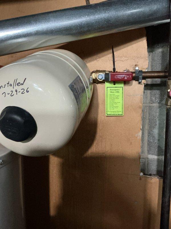Installed a 40-gallon tall water heater with all required code upgrades, including expansion tank, pressure relief valve with proper discharge piping, and shut-off valve assembly. All components were properly labeled and tagged, with installation date documented on the expansion tank for future reference.