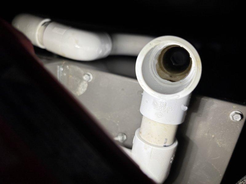 Responded to service call for water leaking into basement from HVAC system. Upon inspection, identified clogged condensate drain line causing water overflow. Cleared blockage from PVC condensate piping, verified proper drainage flow, and confirmed system operating without further leakage.